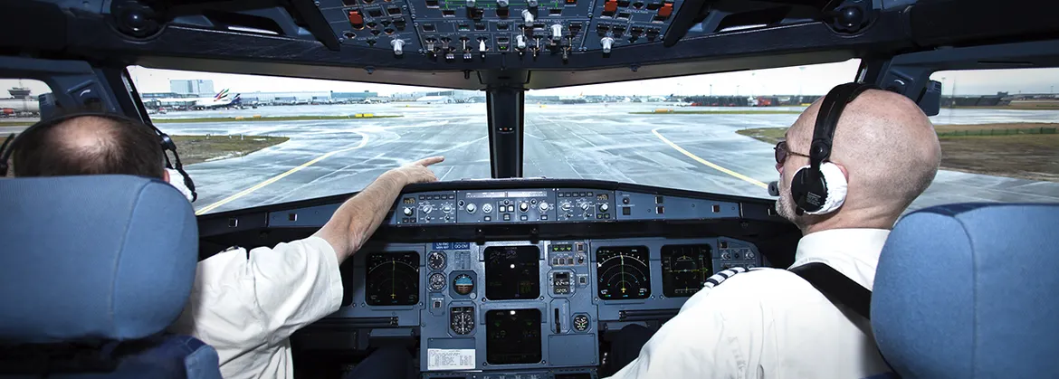 hero image showing two pilots in the cockpit