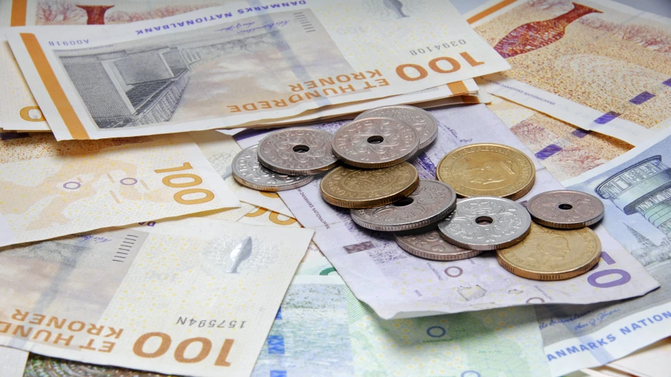 Billede af pengesedler og mønter